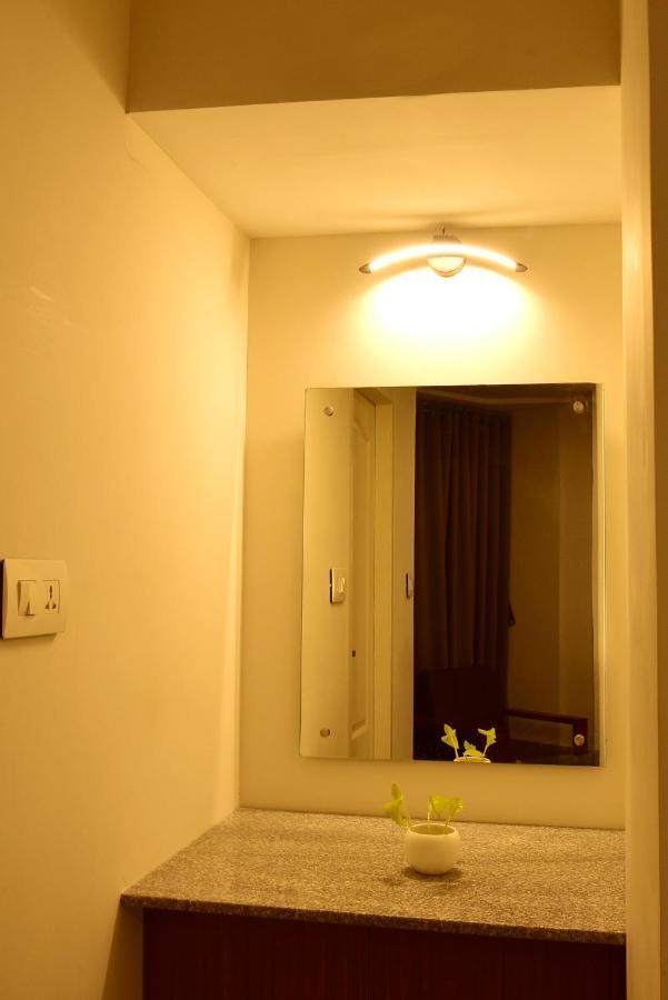 White Suite Hotel Kozhikode Bagian luar foto