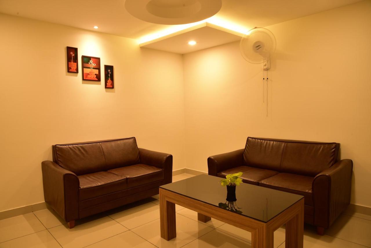 White Suite Hotel Kozhikode Bagian luar foto